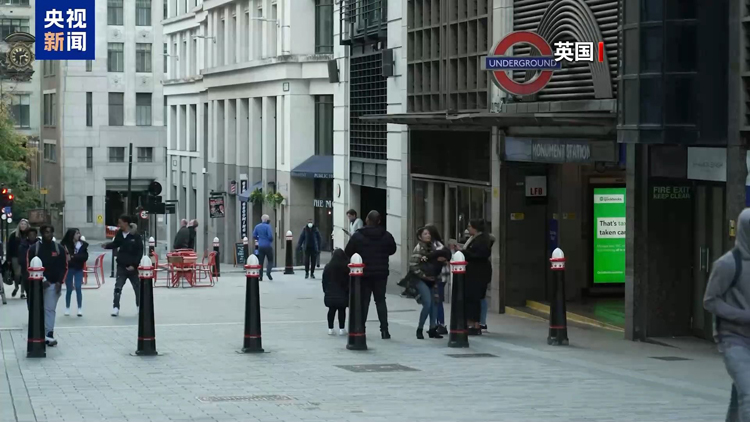 英首相重申向?yàn)跖杀?稱必須有美國支持