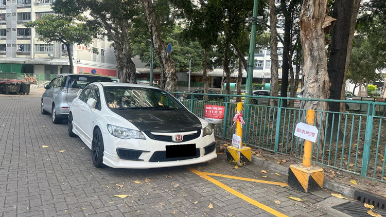申訴專員主動(dòng)調(diào)查公屋違例泊車  房署接納12項(xiàng)改善建議