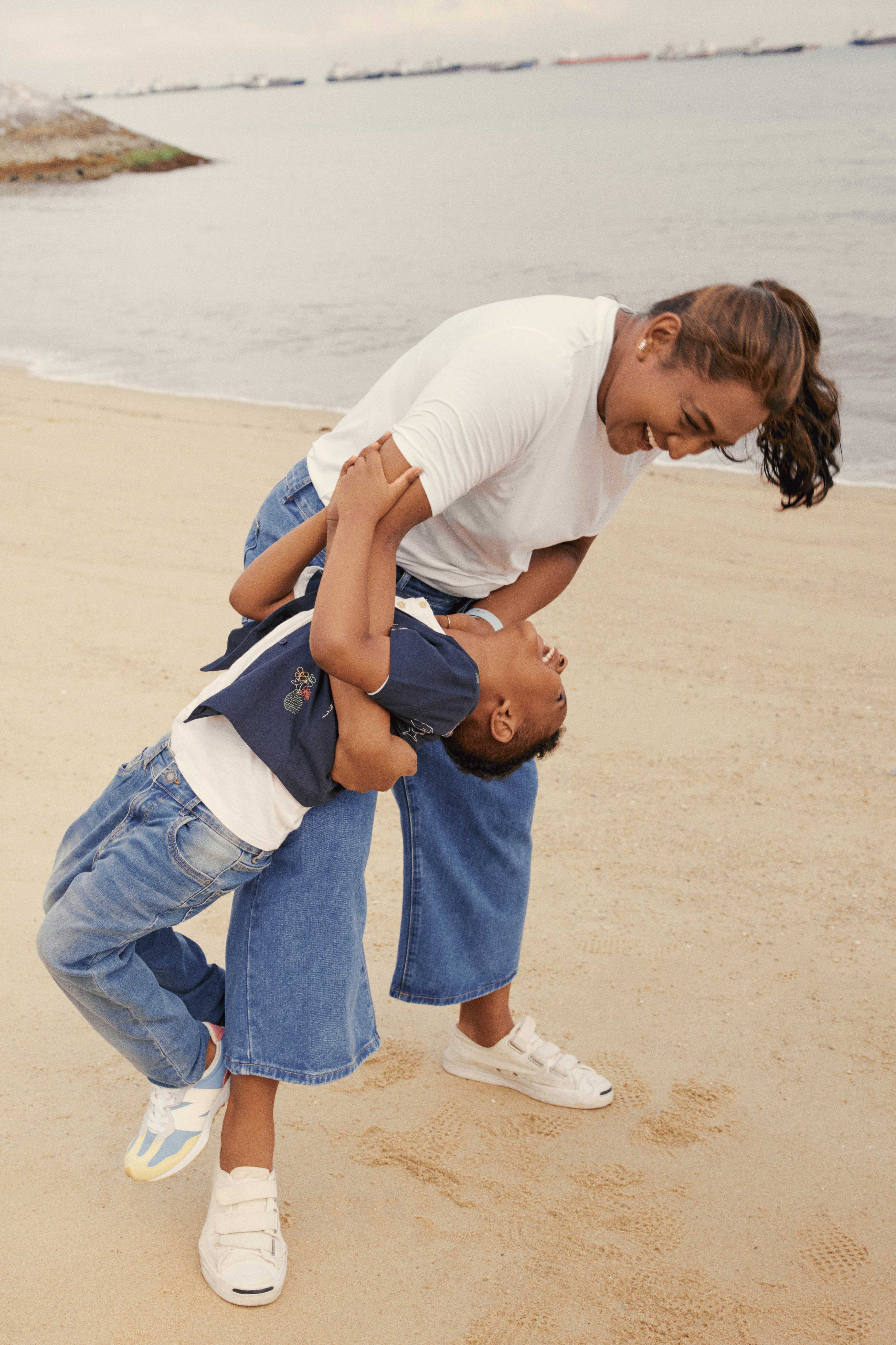 Embrace_FAldari Maternity Supima Cotton Tee (White), Aureelia Straight High Rise Jeans (Medium Denim Washed), Billie Unisex Embroidered Shirt in Humble Abode (Navy Blue).jpg